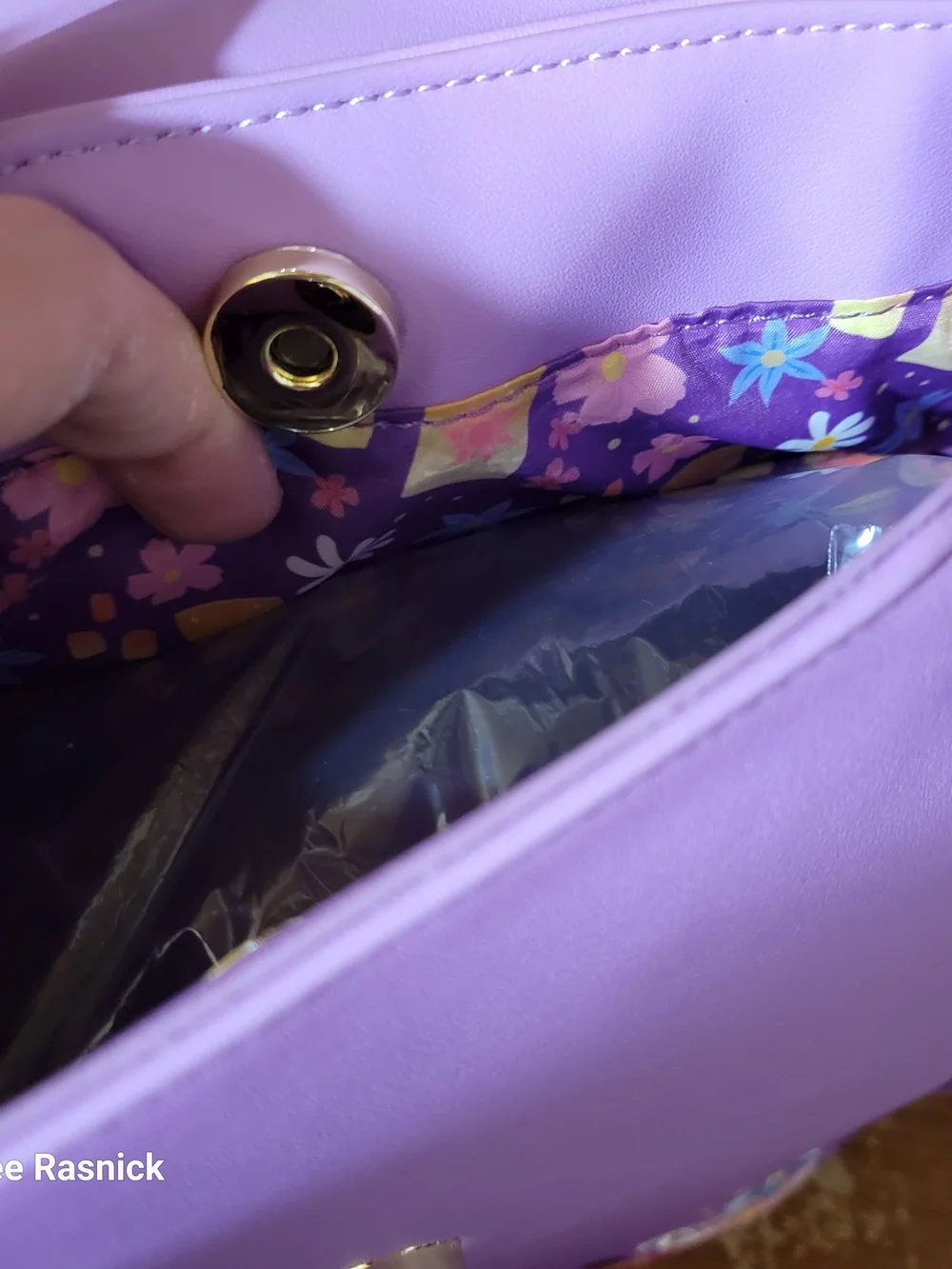 Loungefly Tangled Rapunzel Exclusive Floral Flap Mini Backpack with Coin Bag.